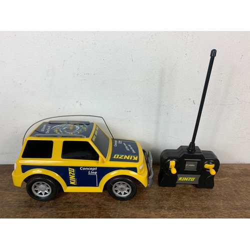 98 - Concept Line Kinzo Plus remote control car in box. Box measures 33cm