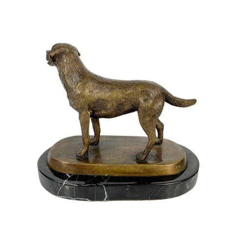 208 - Vintage bronze dog on a marble base. 22x18cm