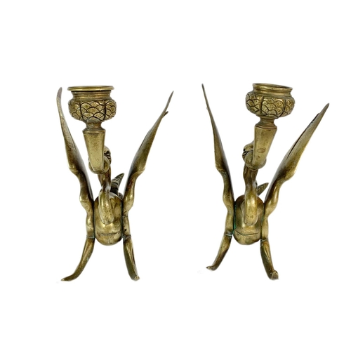 209 - Pair of early 20th century heavy brass candle holders. 17x17cm