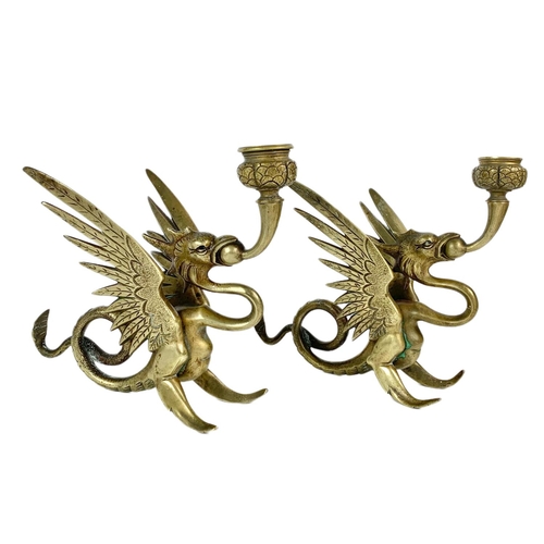 209 - Pair of early 20th century heavy brass candle holders. 17x17cm