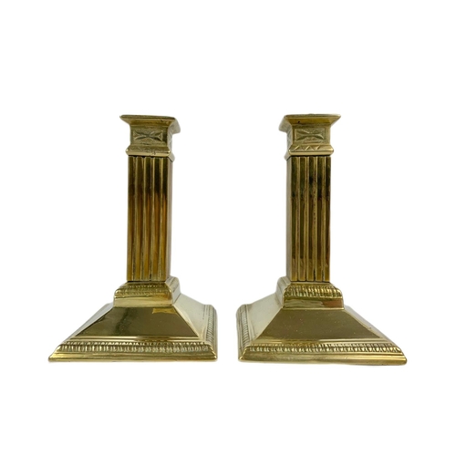 212 - Pair of Victorian brass candle sticks. 15cm