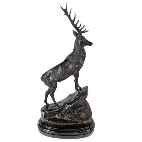 24 - Pair of bronze stags, signed J. Moigniez, 73.5cm