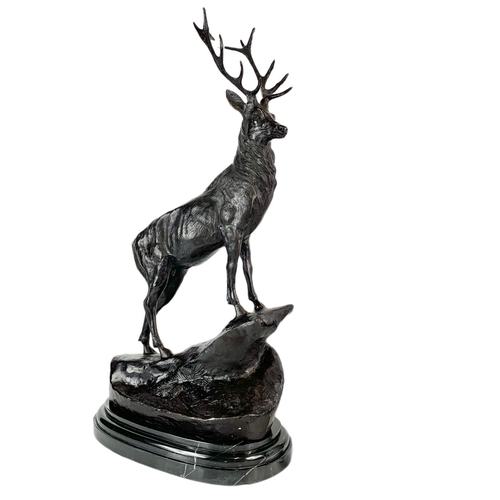 24 - Pair of bronze stags, signed J. Moigniez, 73.5cm