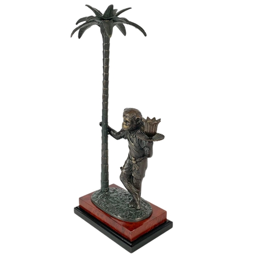 25 - Bronze monkey candle holder, 49cm