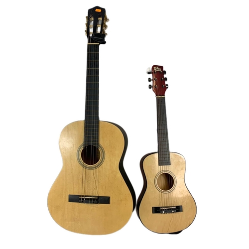 427 - 2 Accoustic guitars. Largest is 101cm