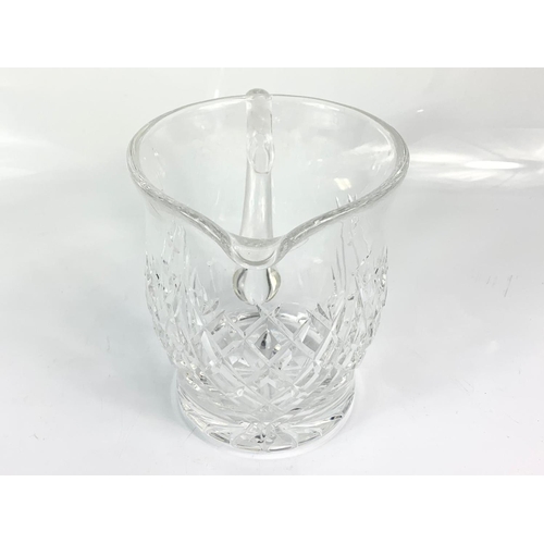 433 - Large Waterford crystal jug. 16cm