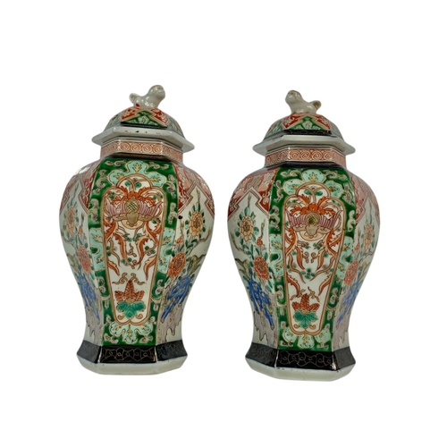 436 - Pair of early 20th century Chinese pots with lids, circa 1900-1910, 23cm