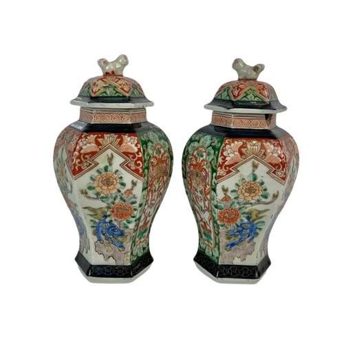 436 - Pair of early 20th century Chinese pots with lids, circa 1900-1910, 23cm