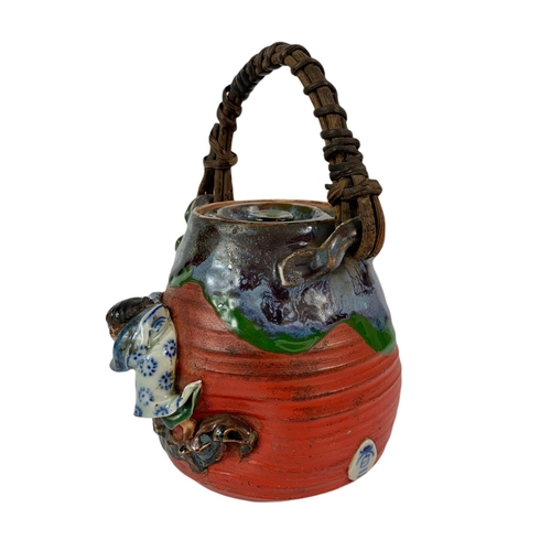 439 - Japanese Sumida Gawa pottery tea pot, the Meiji period. 21cm