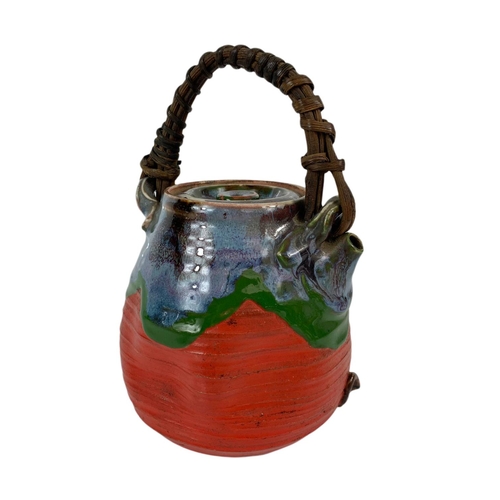 439 - Japanese Sumida Gawa pottery tea pot, the Meiji period. 21cm