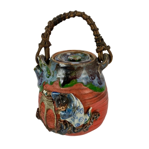 439 - Japanese Sumida Gawa pottery tea pot, the Meiji period. 21cm