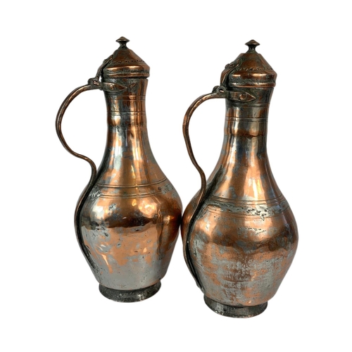 44 - Pair of 19th century style copper jugs. 51cm