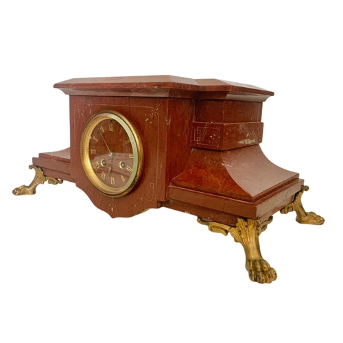 108 - Victorian red marble mantle clock with brass mounts, key, pendulum and bell. 48 x 25 x 21cm