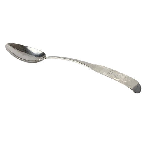 668 - Irish silver serving spoon, 62.5 grams. 23cm