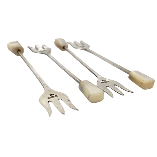 674 - Set of 4 silver cocktail forks