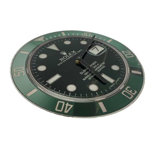 704 - Rolex themed wall clock, 30cm