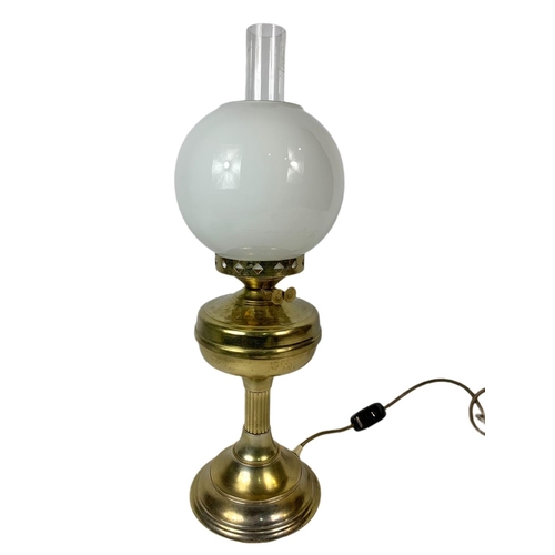 346 - Brass oil lamp electrified. 57cm