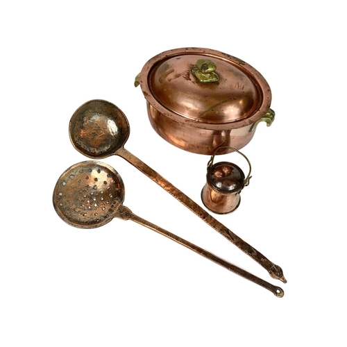 220 - 4 pieces of Victorian copperware, ladles are 52cm