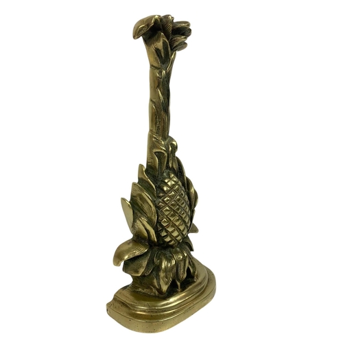 234 - Victorian brass door stopper. 33cm