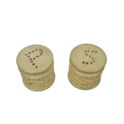 236 - Vintage Chinese carved Ivory salt and pepper shakers. 3.5cm