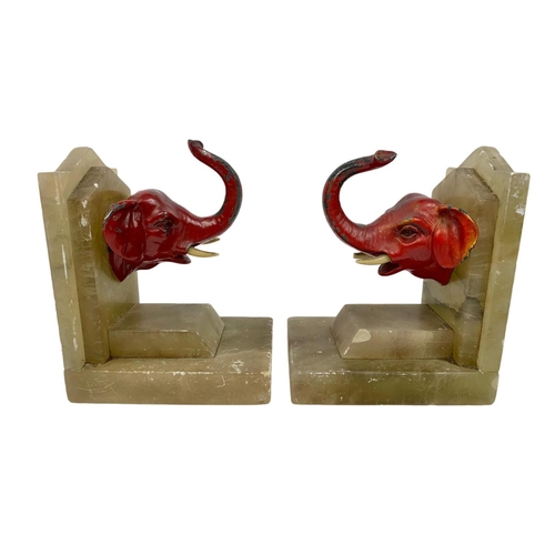 243 - Pair of alabaster and spelter bookends. Circa 1930’s. 8.5 x 12 x 14cm