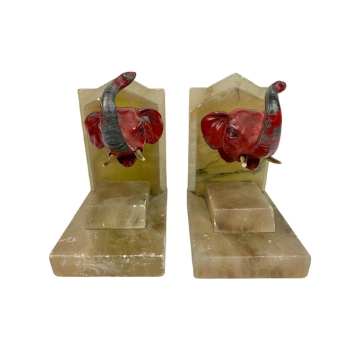 243 - Pair of alabaster and spelter bookends. Circa 1930’s. 8.5 x 12 x 14cm