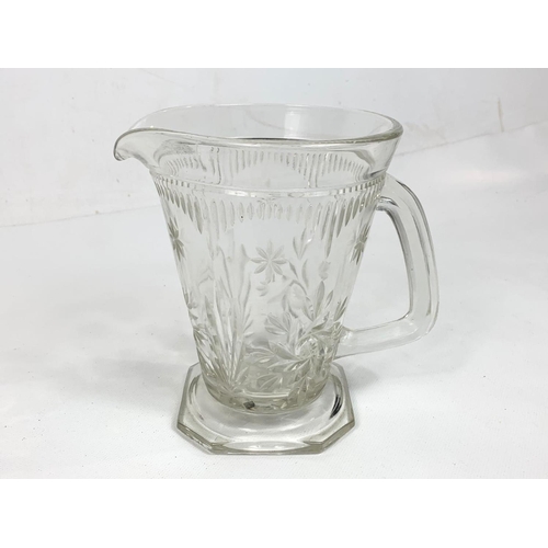 475 - 5 large early 20th century Victorian glass jugs. 21cm ,