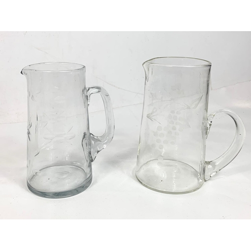 475 - 5 large early 20th century Victorian glass jugs. 21cm ,