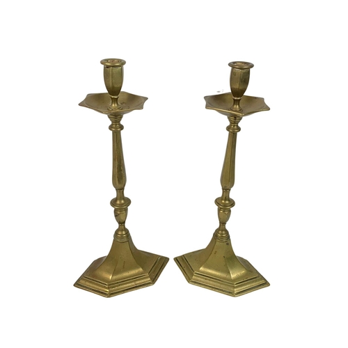 504 - Pair of large early 20th century brass candlesticks, 30cm