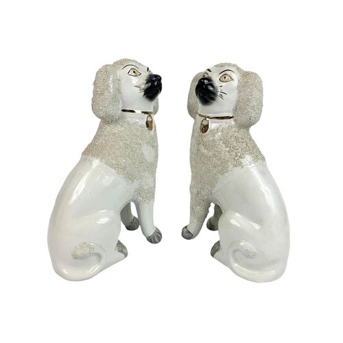 508 - Pair of Victorian Staffordshire dogs, 29cm