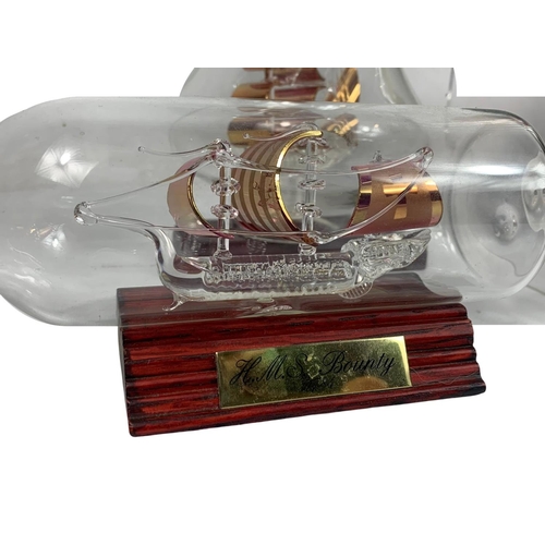 516 - Quantity of glass ships in bottles, 23cm