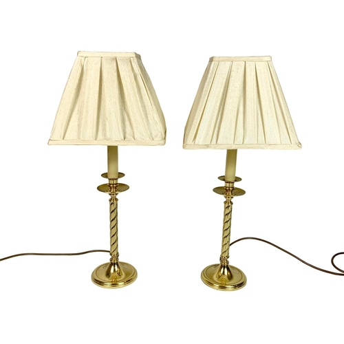 84 - Pair of large brass lamps in the style of candles, 59cm