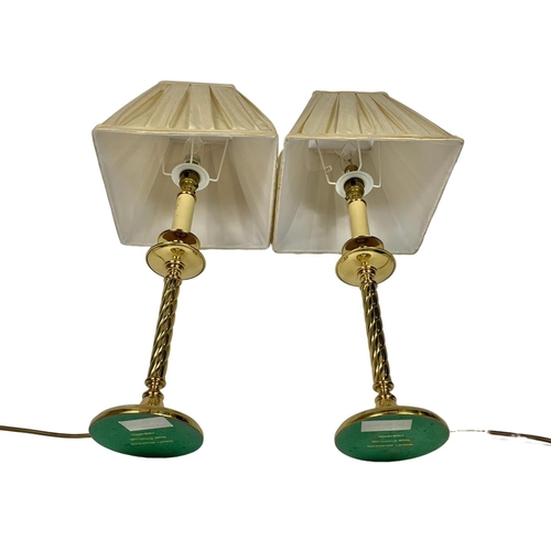 84 - Pair of large brass lamps in the style of candles, 59cm