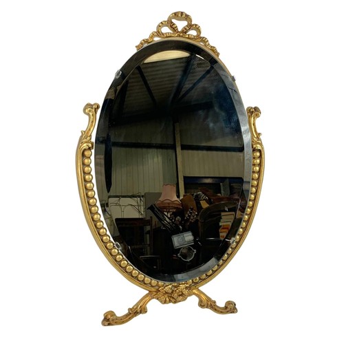 98 - Ornate gilt framed dressing mirror. 57cm