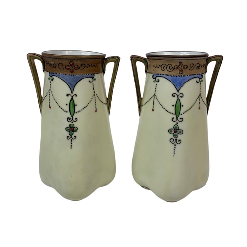 642 - Pair of Noritaki pottery vases. 13.5cm