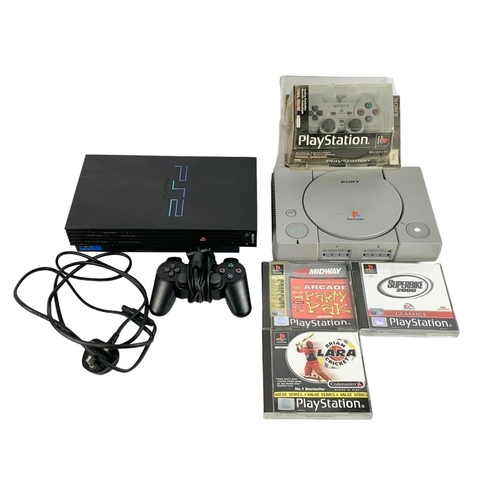 128 - PS4 and PS1 with games and controllers. PS1 controller unopened