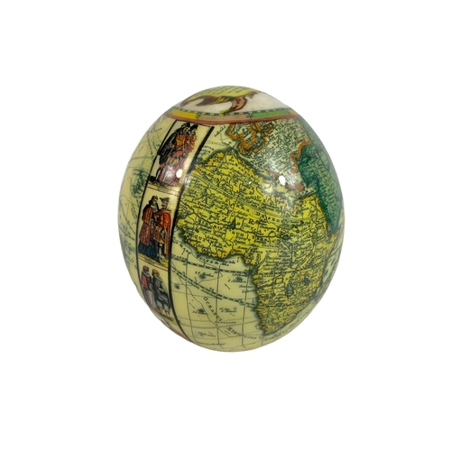 296 - Vintage school bell with an decoupaged ostrich egg. Bell measures 19cn