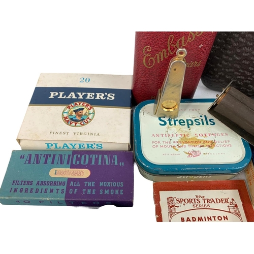 318 - Vintage smoking related items. Pipes etc.