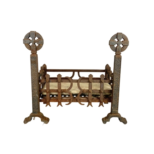 372 - Early 20th century cast iron fire grate. 61 x 35 x 53.5cm