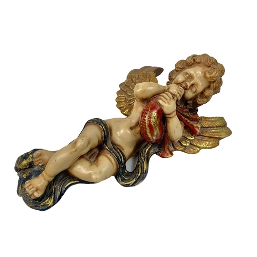 550 - 2 cherub plaques. 19cm