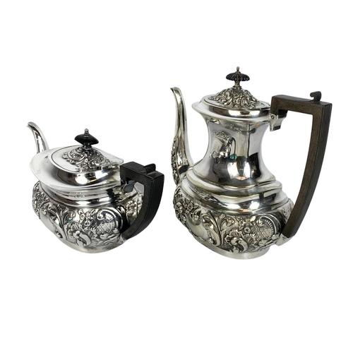 554 - 2 piece early 20th century silver plated tea service. JBC & SL.