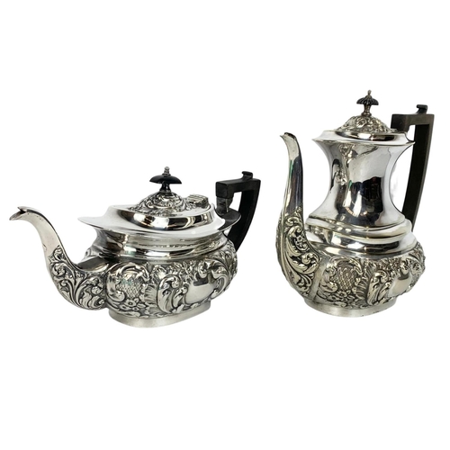 554 - 2 piece early 20th century silver plated tea service. JBC & SL.