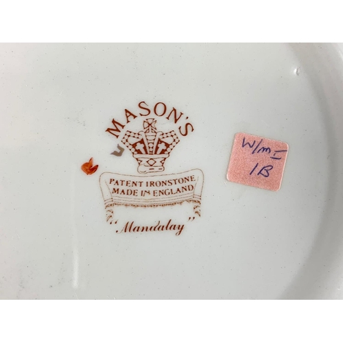 579 - 11 Masons pottery plates. 22.5cm