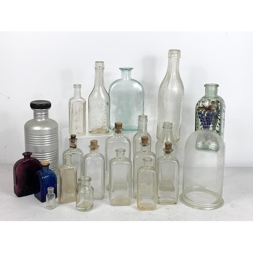 585 - Quantity of early 20th century glass bottles and jars