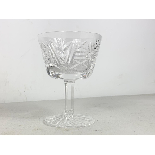 593 - Set of 4 Waterford Crystal glasses. 8 x 10.5cm