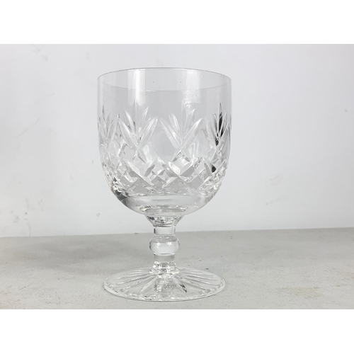 594 - 5 Royal Doulton crystal glasses and 2 pieces of Tyrone. Jar measures 16.5cm