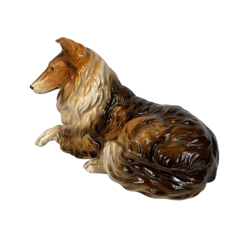 687 - Large pottery dog ornament, 29cm x 18cm