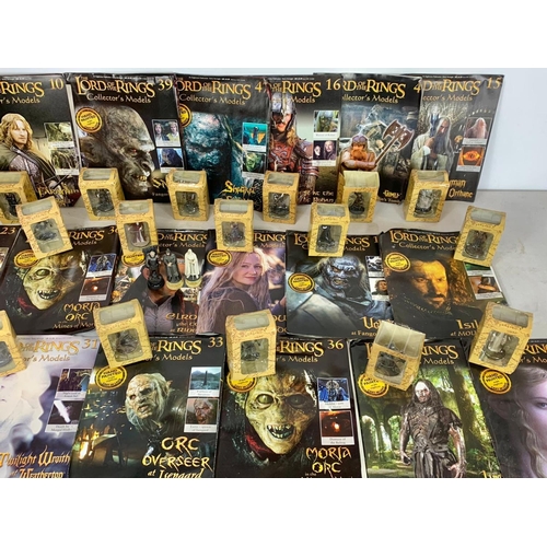 635 - Quantity of The Lord Of The Rings collectors models. Boxes measure 11cm