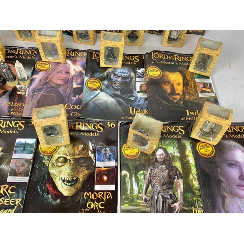 635 - Quantity of The Lord Of The Rings collectors models. Boxes measure 11cm