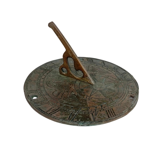 625 - 19th century brass sundial. 17.5cm